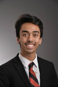 Three quarters portrait of a young professional man