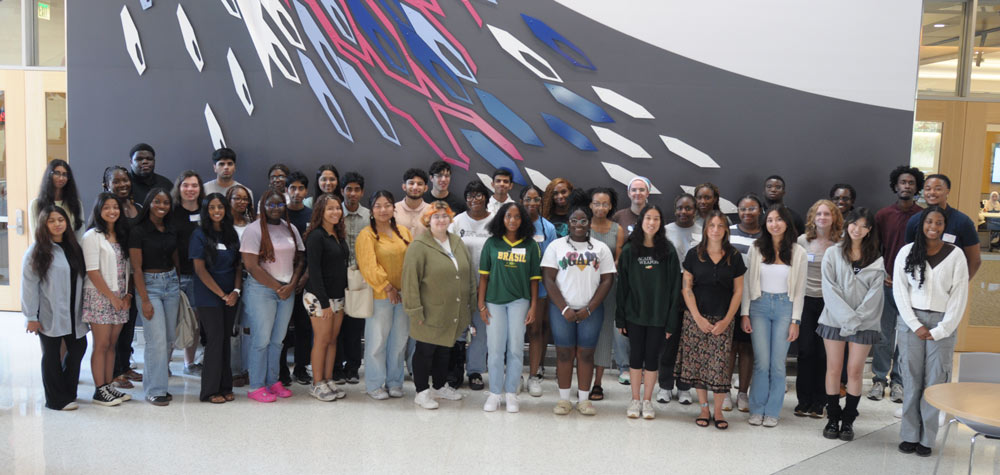 About twenty-five students standing together for a group picture